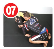 When his opponent hits the mat he’s forced to at least post with one hand to the mat or else he’s going to smash his head. When he does this it opens up the opportunity for the guillotine.