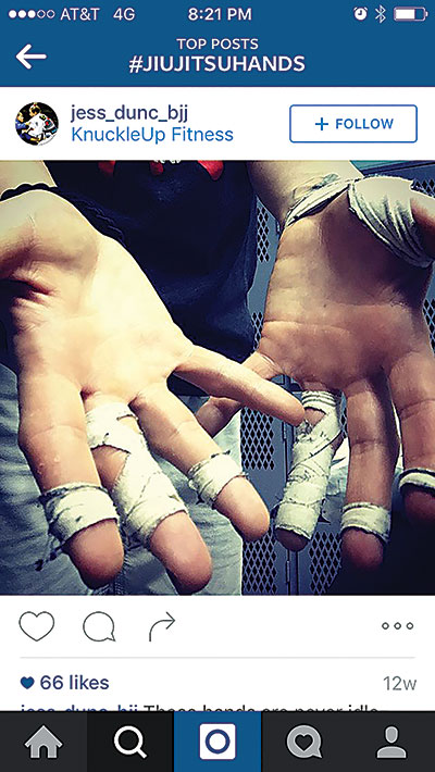 This up-close and personal image of taped fingers is so common a sight on the mat, it can easily be overlooked as an interesting shot, but to outsiders it gives a fascinating peek into the jiu-jitsu world.